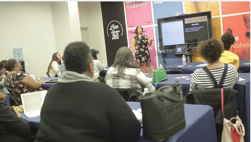 Brandi Fox speaking at a live event